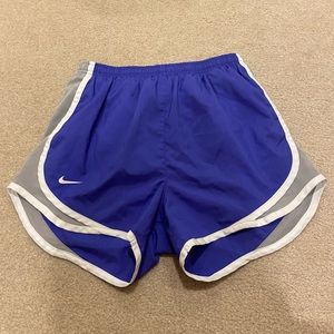 Purple Nike running shorts